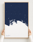 Long Beach canvas map — hands holding the canvas in an oak frame