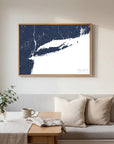 Long Island navy horizontal canvas map in an oak framed room scene