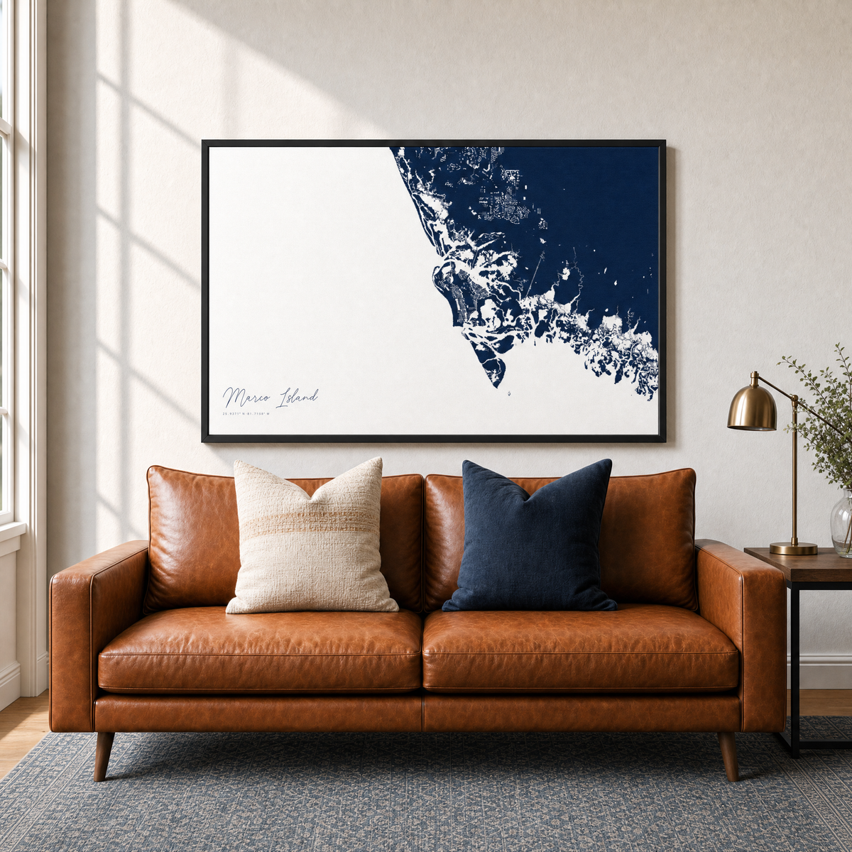 Marco Island canvas map — two-pillow black-frame sofa interior