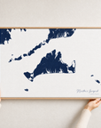 Martha's Vineyard canvas map — hands holding the canvas in an oak frame