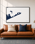 Montauk canvas map — two-pillow black-frame sofa interior