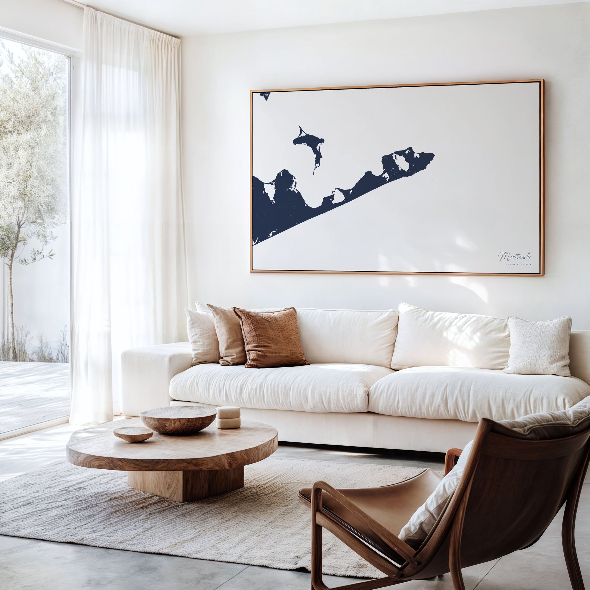 Montauk navy horizontal canvas map in an oak framed room scene