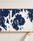 Mount Desert canvas map — hands holding the canvas in an oak frame