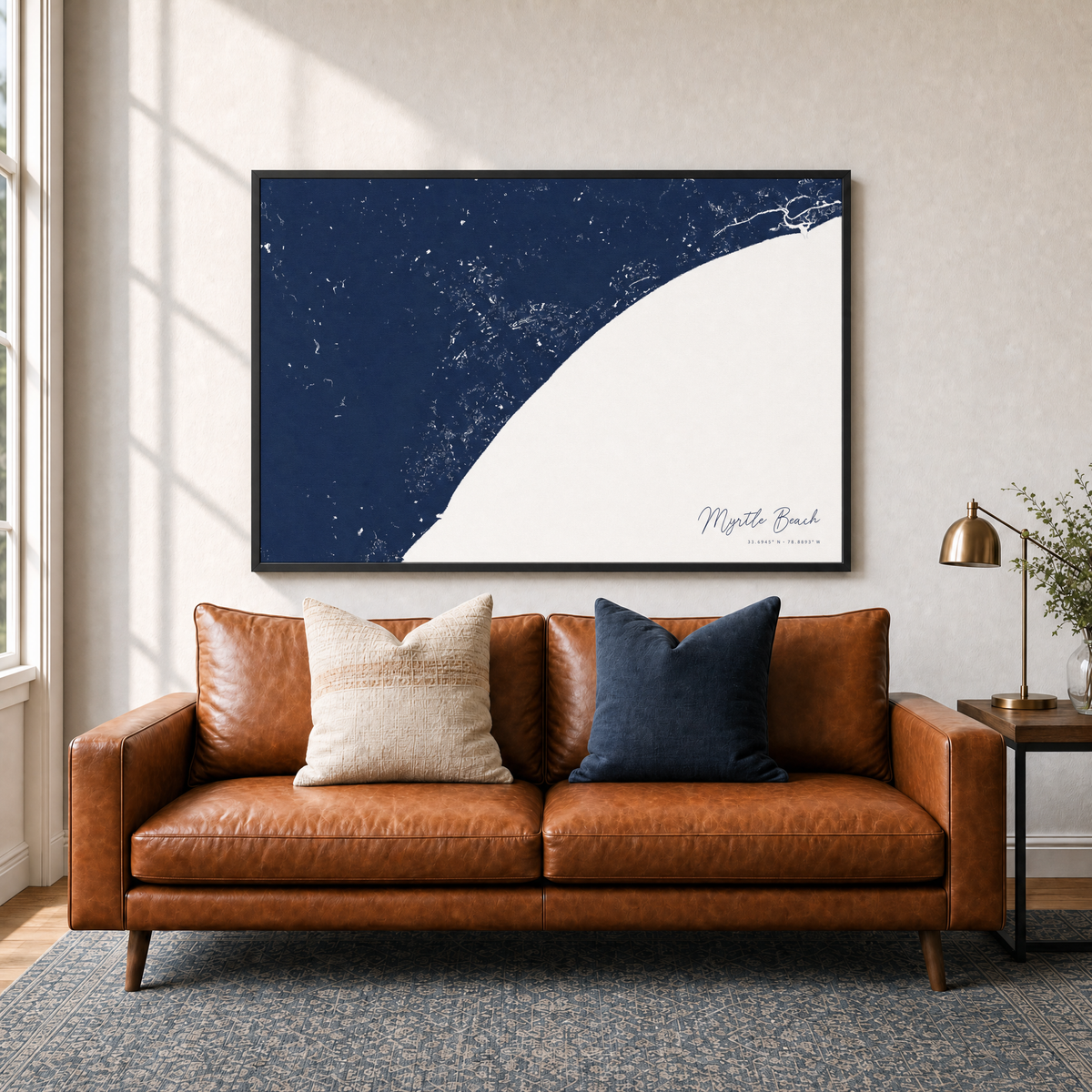 Myrtle Beach canvas map — two-pillow black-frame sofa interior