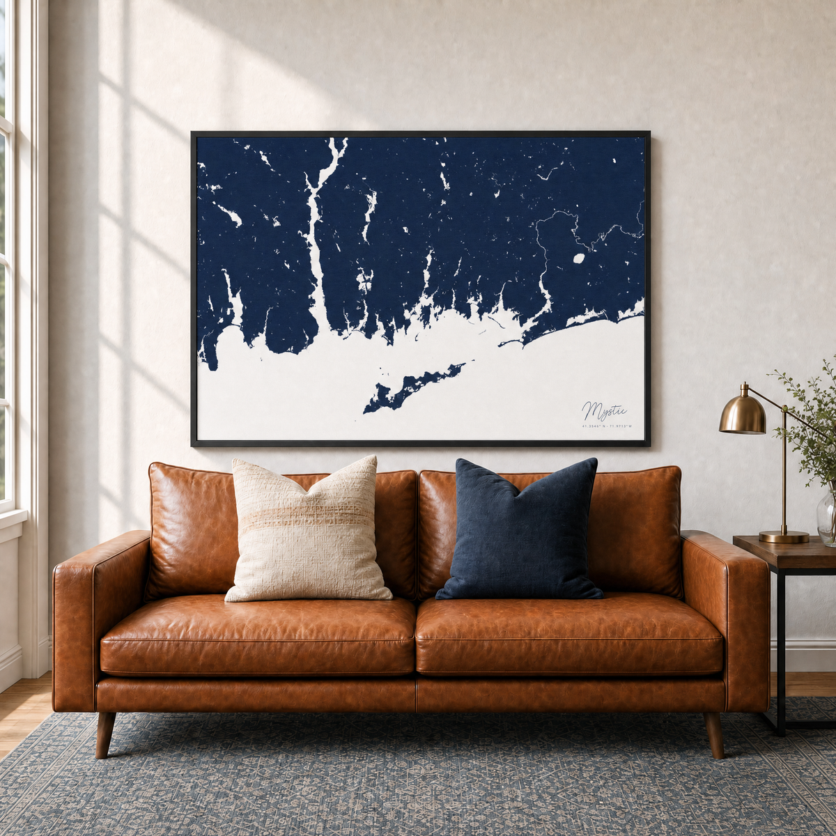 Mystic canvas map — two-pillow black-frame sofa interior