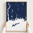 Mystic canvas map — hands holding the canvas in an oak frame