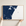 New Hampshire Coast canvas map — hands holding the canvas in an oak frame