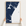 New Hampshire Coast canvas map — hands holding the canvas in an oak frame