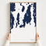 Newport canvas map — hands holding the canvas in an oak frame