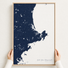 North Shore Massachusetts canvas map — hands holding the canvas in an oak frame