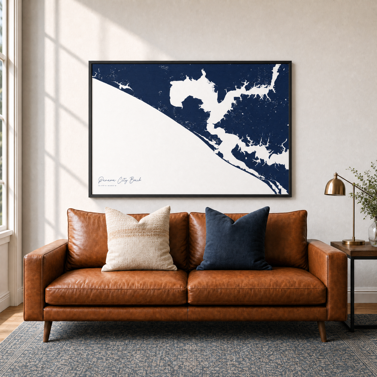 Panama City Beach canvas map — two-pillow black-frame sofa interior