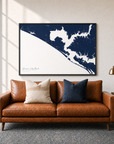 Panama City Beach canvas map — two-pillow black-frame sofa interior