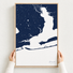 Pensacola canvas map — hands holding the canvas in an oak frame