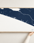 30A horizontal canvas map in Navy, hands holding an oak-framed canvas