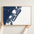 Avalon horizontal canvas map in Navy, hands holding an oak-framed canvas
