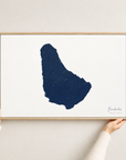 Barbados horizontal canvas map in Navy, hands holding an oak-framed canvas