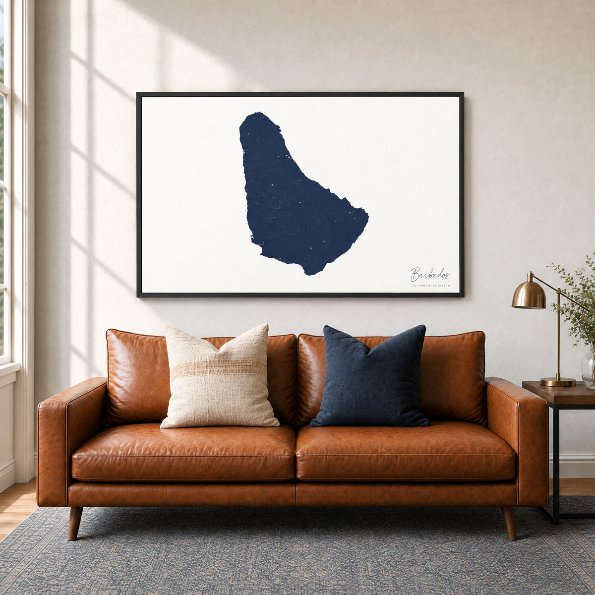 Barbados horizontal canvas map in Navy, black-framed canvas above a sofa