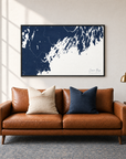Casco Bay horizontal canvas map in Navy, black-framed canvas above a sofa
