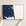 Dewey Beach horizontal canvas map in Navy, hands holding an oak-framed canvas