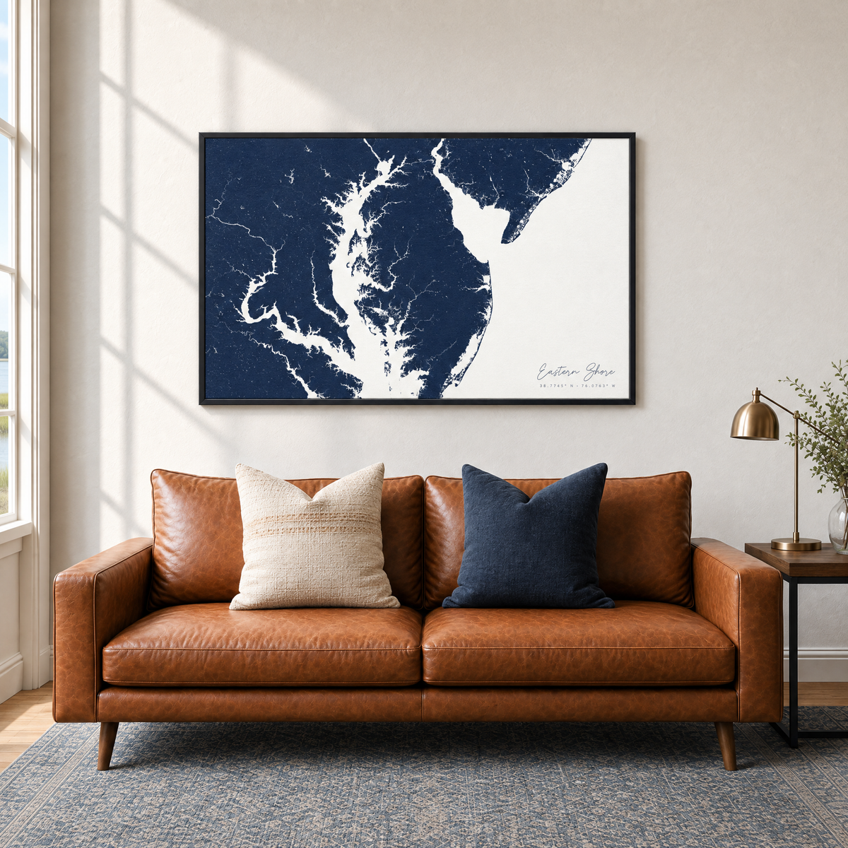 Eastern Shore horizontal canvas map in Navy, black-framed canvas above a sofa