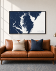 Eastern Shore horizontal canvas map in Navy, black-framed canvas above a sofa