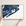 Folly Beach horizontal canvas map in Navy, hands holding an oak-framed canvas