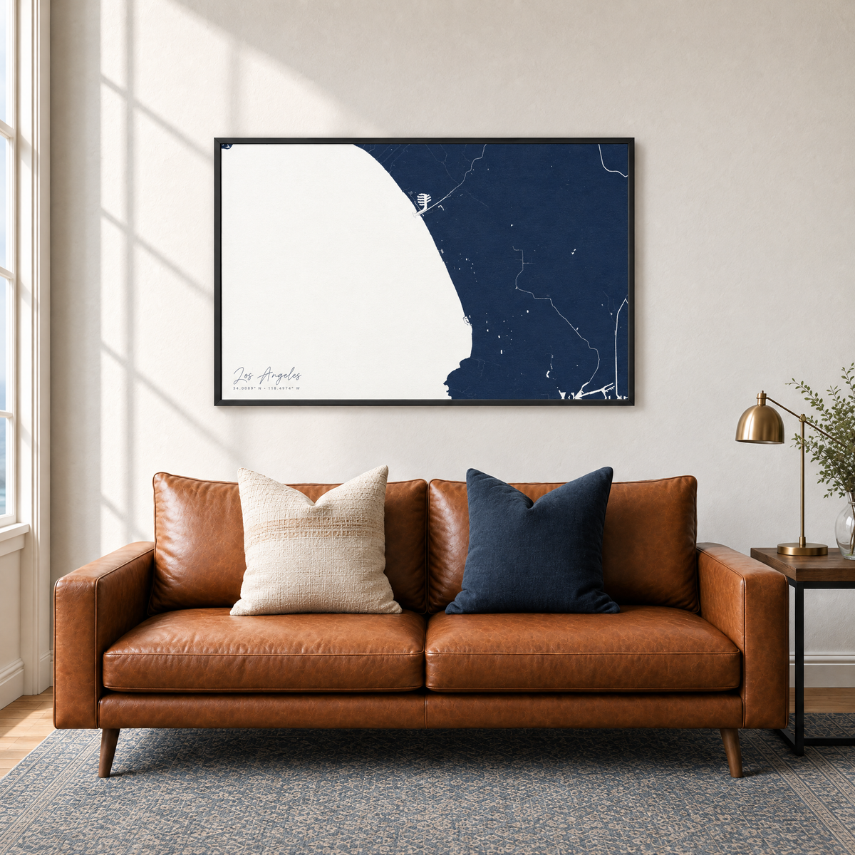 Los Angeles horizontal canvas map in Navy, black-framed canvas above a sofa