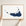 Nantucket horizontal canvas map in Navy, hands holding an oak-framed canvas