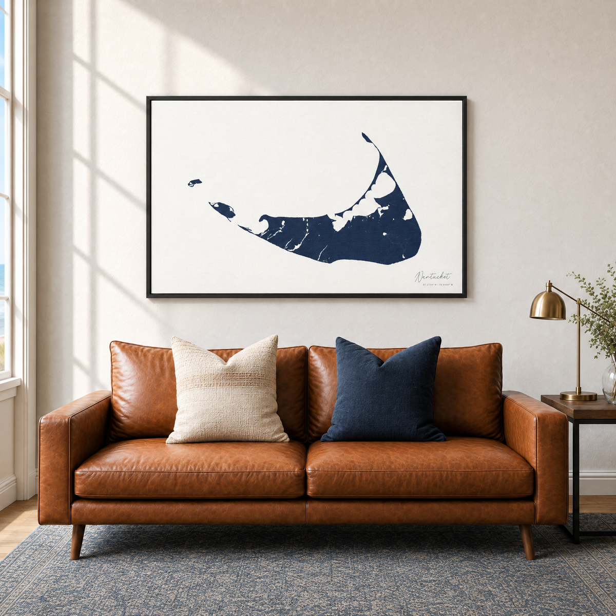 Nantucket horizontal canvas map in Navy, black-framed canvas above a sofa