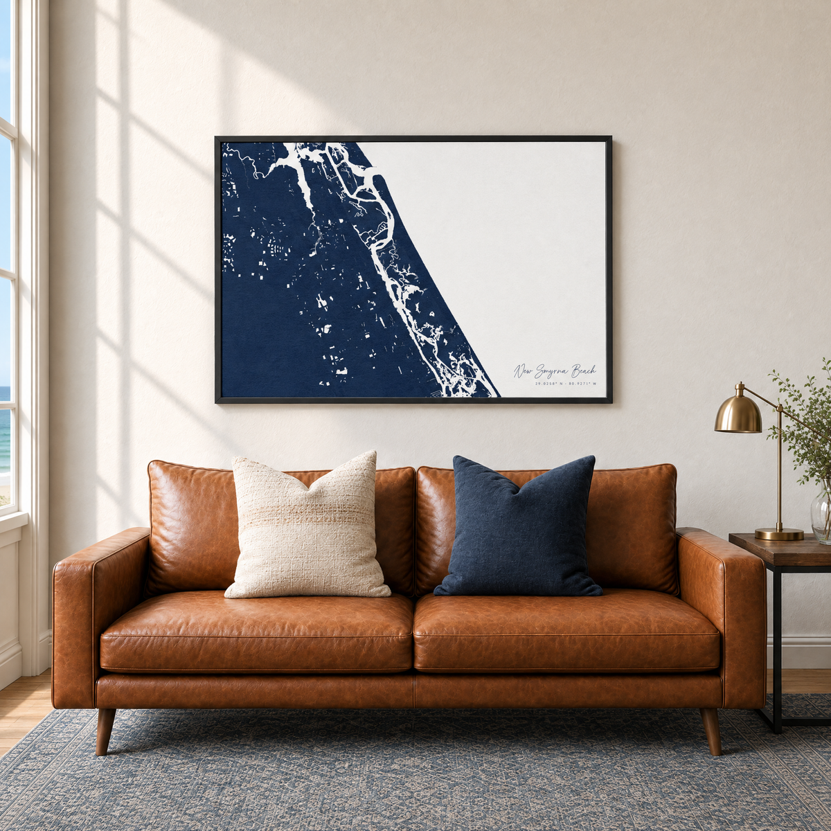 New Smyrna Beach horizontal canvas map in Navy, black-framed canvas above a sofa
