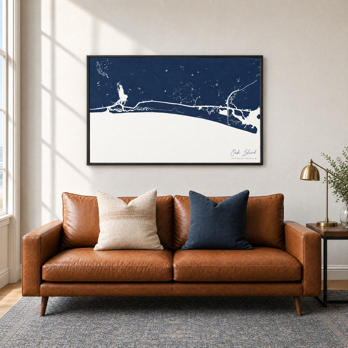 Oak Island horizontal canvas map in Navy, black-framed canvas above a sofa