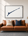 Ocracoke horizontal canvas map in Navy, black-framed canvas above a sofa