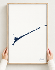 Ocracoke vertical canvas map in Navy, hands holding an oak-framed canvas