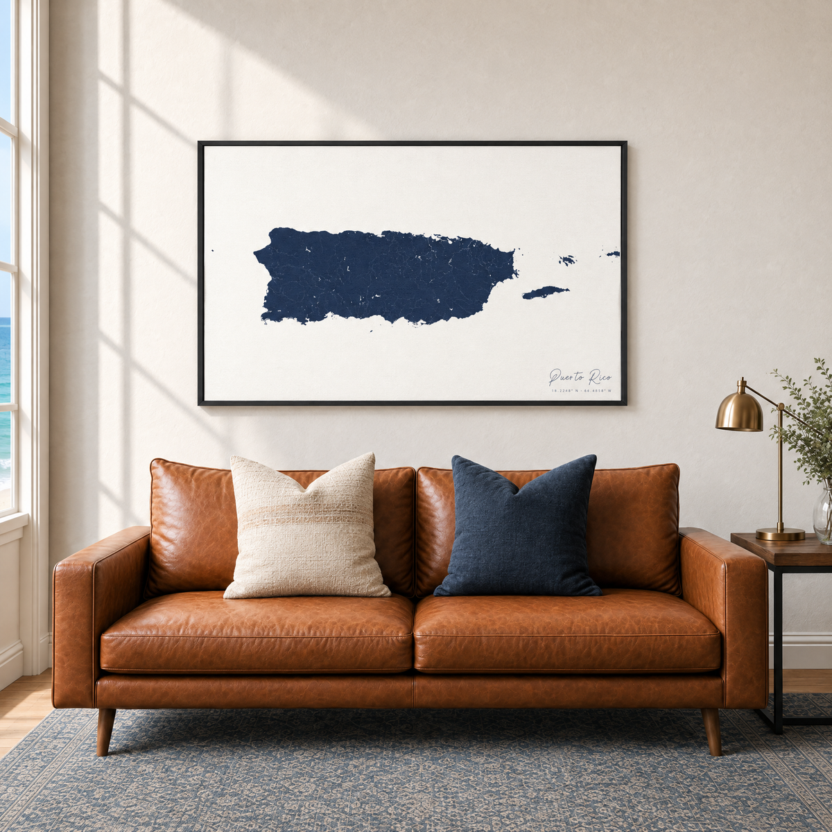 Puerto Rico horizontal canvas map in Navy, black-framed canvas above a sofa