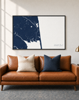Rehoboth Beach horizontal canvas map in Navy, black-framed canvas above a sofa
