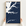 Sassafras River vertical canvas map in Navy, hands holding an oak-framed canvas