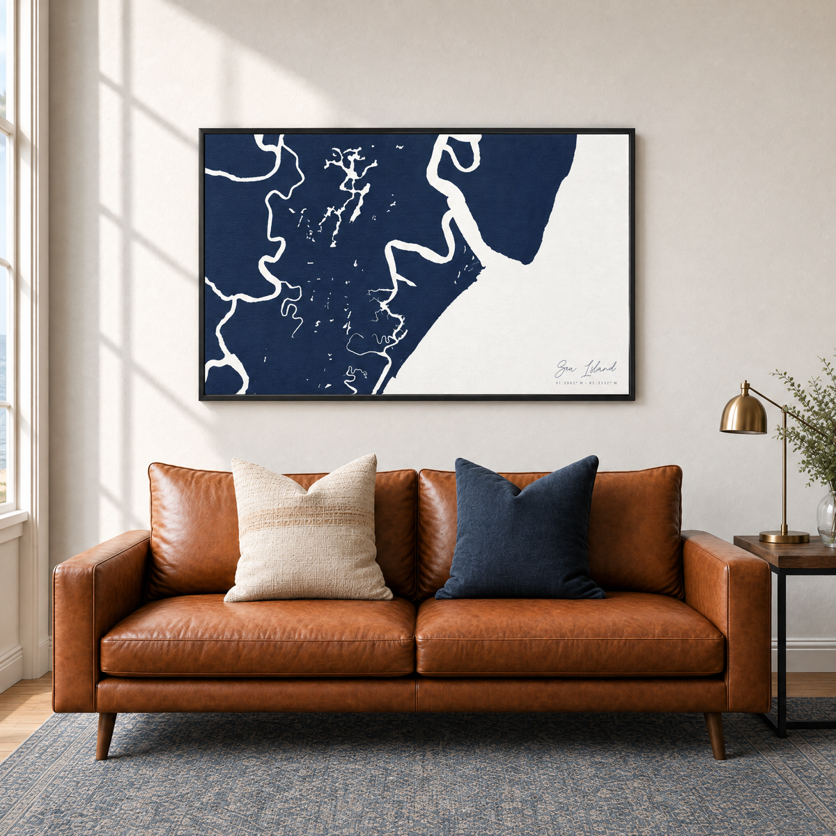 Sea Island horizontal canvas map in Navy, black-framed canvas above a sofa