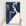 Sea Island vertical canvas map in Navy, hands holding an oak-framed canvas