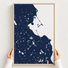 Plymouth canvas map — hands holding the canvas in an oak frame