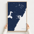 Portsmouth canvas map — hands holding the canvas in an oak frame