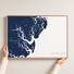 Saint Simons Island canvas map — hands holding the canvas in an oak frame