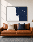San Diego Coast canvas map — two-pillow black-frame sofa interior