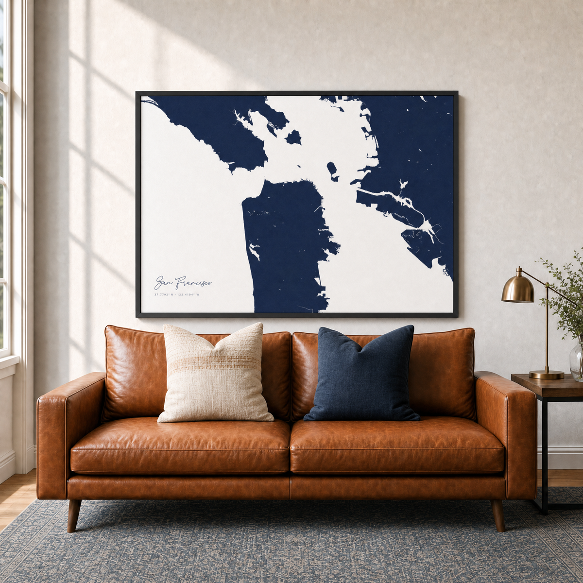 San Francisco canvas map — two-pillow black-frame sofa interior