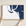 Sanibel canvas map — hands holding the canvas in an oak frame