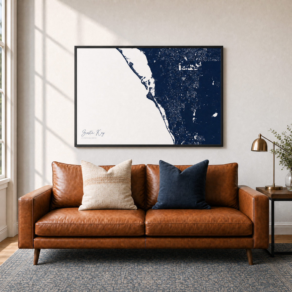 Siesta Key canvas map — two-pillow black-frame sofa interior