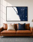 Siesta Key canvas map — two-pillow black-frame sofa interior