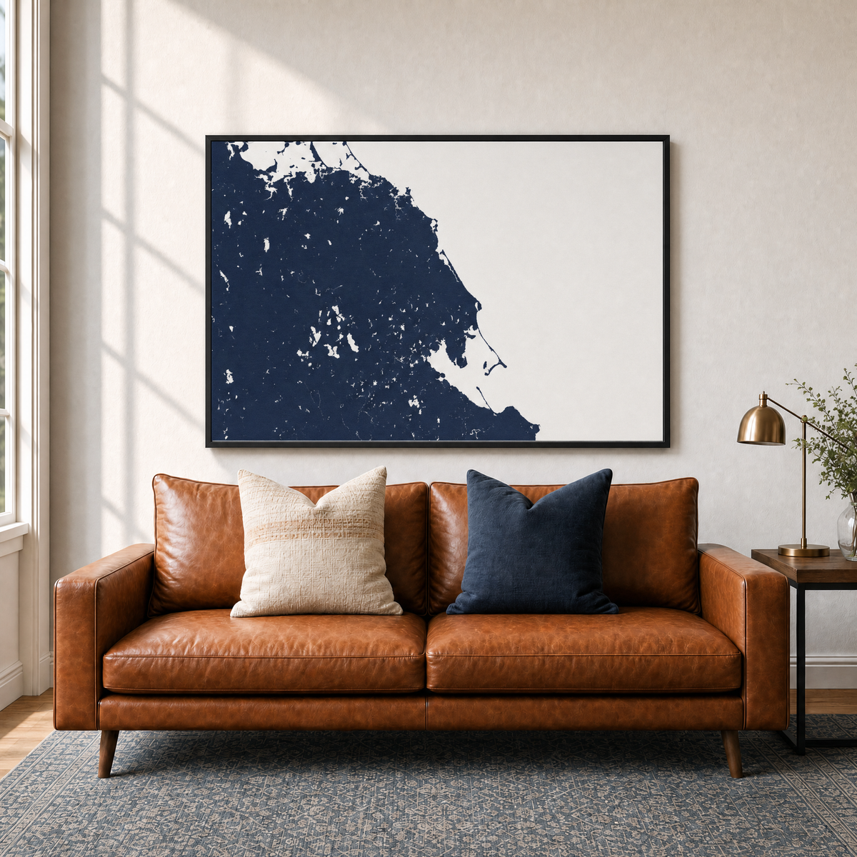 South Shore Massachusetts canvas map — two-pillow black-frame sofa interior