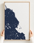 South Shore Massachusetts canvas map — hands holding the canvas in an oak frame