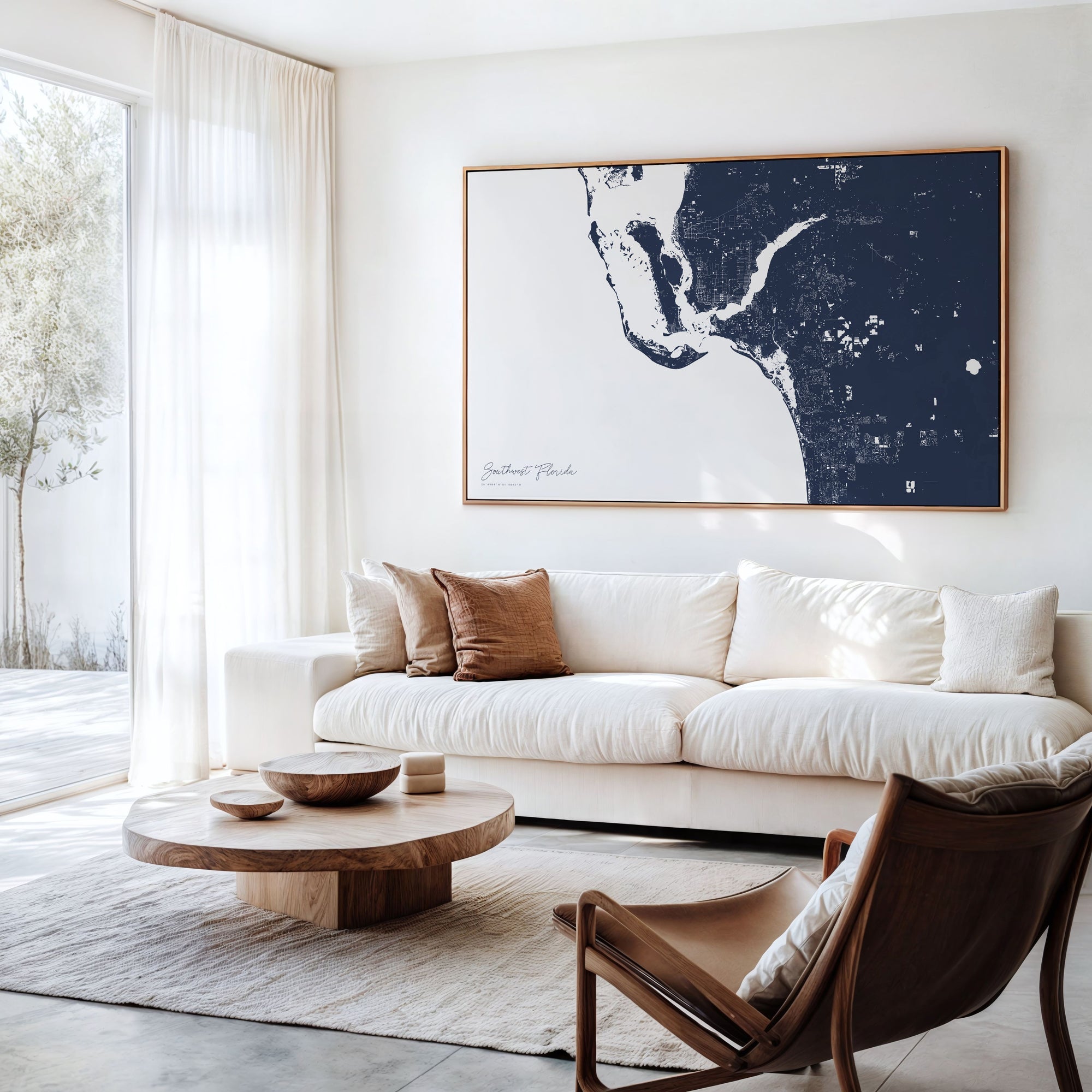 Southwest Florida navy horizontal canvas map in an oak framed room scene
