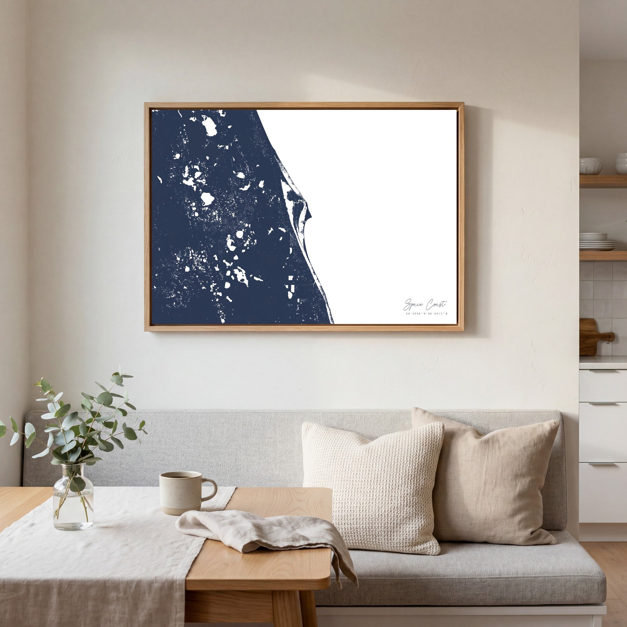 Space Coast navy horizontal canvas map in an oak framed room scene